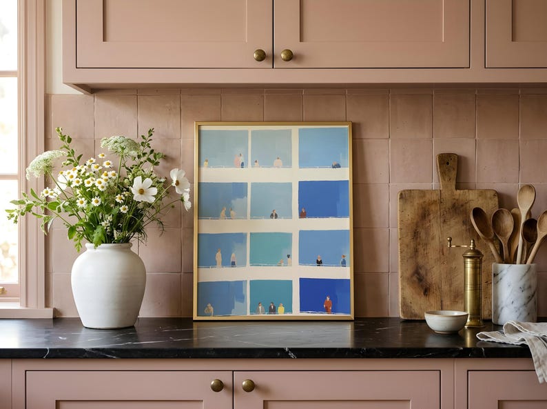 Kitchen counter styling, Tiny People Wall Art propped by vase, blue and cream geometric people grid, whimsical