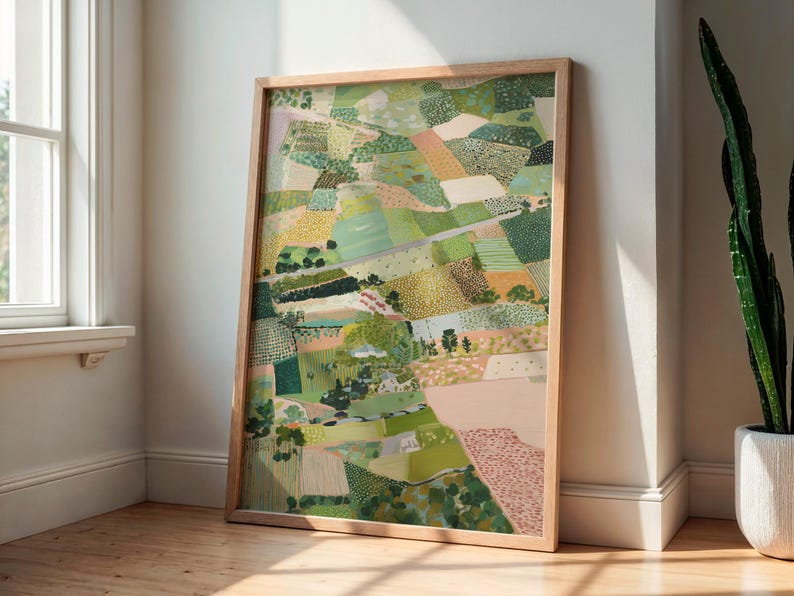 a large, colorful painting of a landscape, displayed on a wooden frame and leaning against a wall.