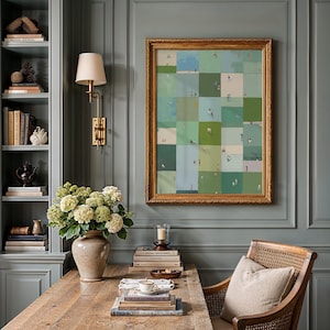 Framed sage checkerboard hung in a cozy study, desk and vase beside it, sage green printable wall art, playful gallery wall print