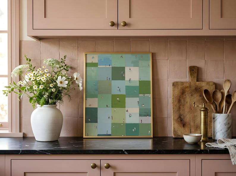 Styled on a kitchen counter between a vase and utensils, framed green grid print, sage green printable wall art, whimsical printable art