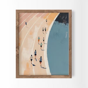 以下が含まれることがあります： トラックを走るランナーを描いた抽象画の額入りアートプリント。ベージュとピーチ色のレーンを走る複数の人物が描かれており、右側には大きな濃い青色の領域が広がっています。木製のフレームに入っています。