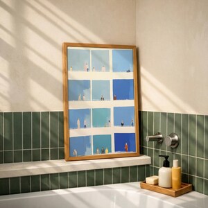 Bathroom shelf styling, Tiny People Wall Art leaned against beige wall, sunlit blue color blocks, modern grid printable