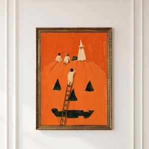 May include: A framed rectangular wall art print featuring a large orange pumpkin with a carved black jack-o'-lantern face. Four small figures dressed in white ghost costumes are positioned on top of the pumpkin, with one climbing a wooden ladder.