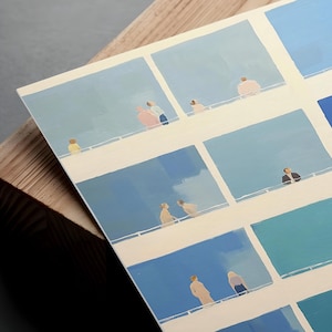 Angled print flat on wood, Tiny People Wall Art close-up, pale blue and cream color blocks, printable digital download