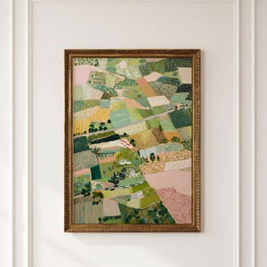 May include: A framed painting depicting an aerial view of a patchwork landscape with fields in shades of green, yellow, pink, and brown. The artwork features textured patterns and dots representing crops and vegetation, enclosed in a gold frame.