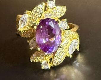 Anello ovale con tanzanite rosa-violacea, foglie di zircone, argento sterling placcato oro, pietra preziosa certificata