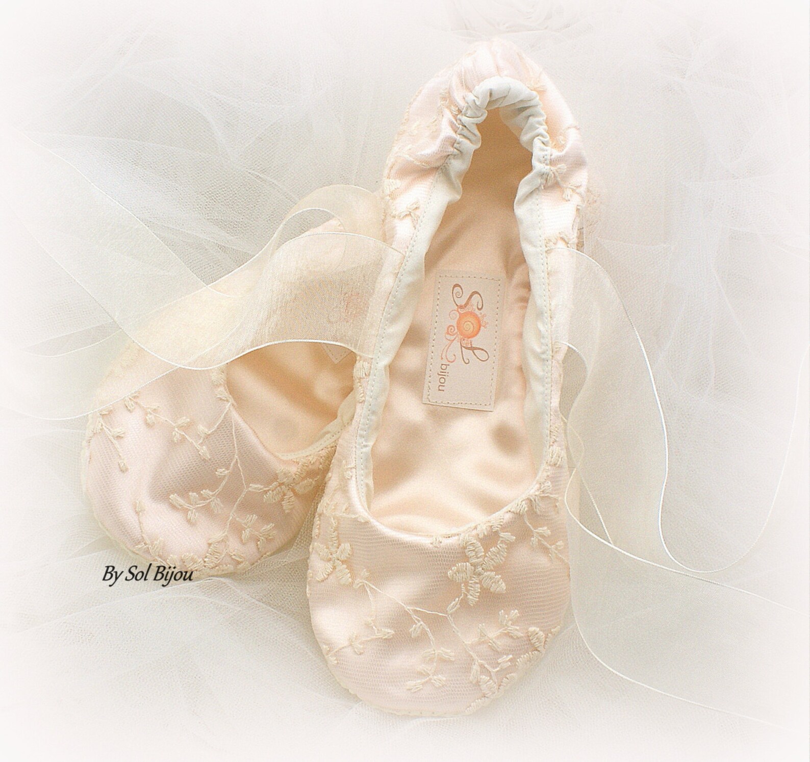 wedding ballet shoes in blush and ivory lace with ribbon ties