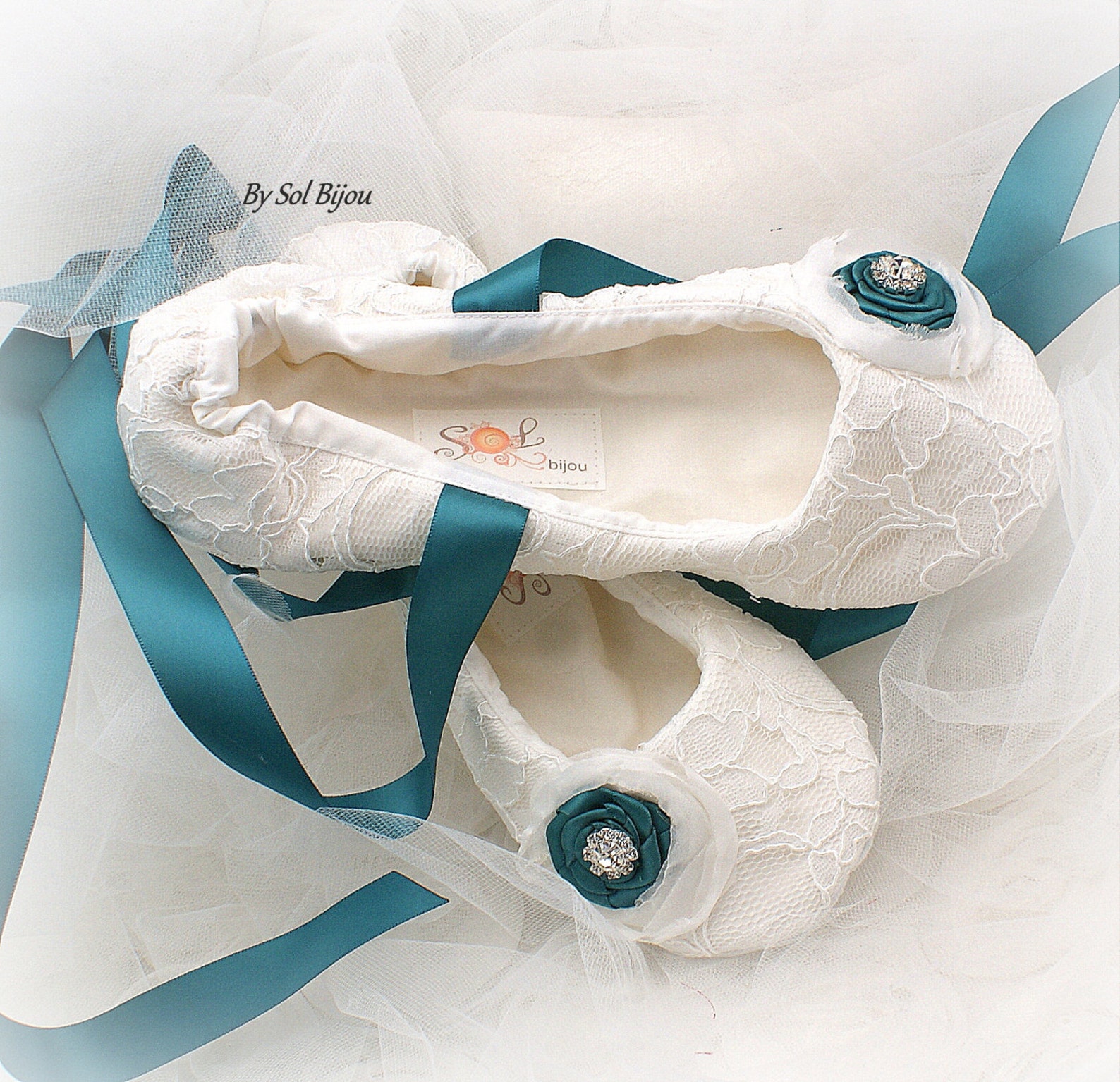 white ballet flats with ribbon ties