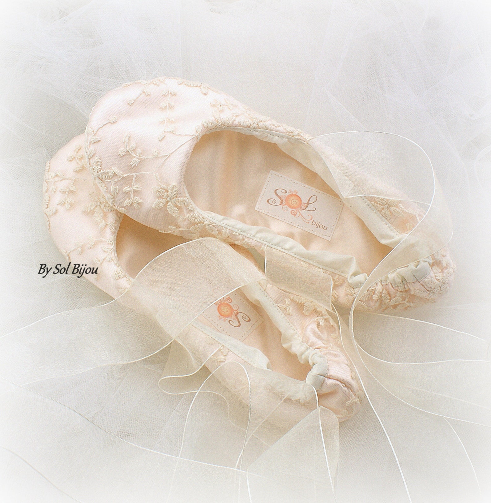 wedding ballet shoes in blush and ivory lace with ribbon ties