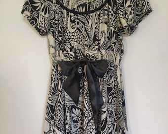 Svart blus med rosett i 100 % siden, Joseph