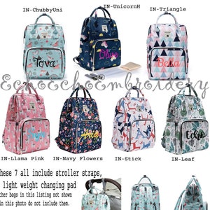 May include: Seven different patterned diaper bags with personalized names. Each bag has a different design, including llamas, flowers, unicorns, and geometric patterns. The bags are all black with a zipper closure and have a handle on top. The text "These 7 all include stroller straps, & light weight changing pad" is at the bottom of the image.