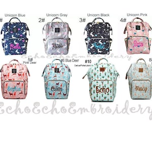 May include: Ten different diaper bags with various patterns and colors. The bags are numbered 1 through 10 and each has a different name embroidered on the front. The patterns include unicorns, deer, cacti, and foxes.