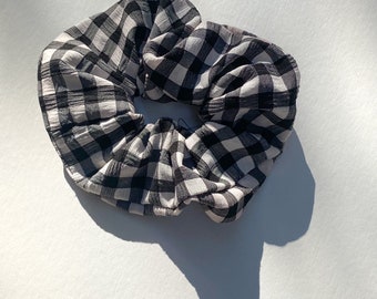 Upcycled scrunchie handmade by us.