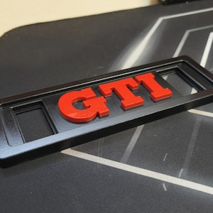 Supporto Votex GTI a 2 pulsanti per la console centrale GOLF 2
