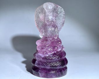 Cráneo de Buda de cristal con forma de serpiente de fluorita morada hecho a mano (9,1 cm)