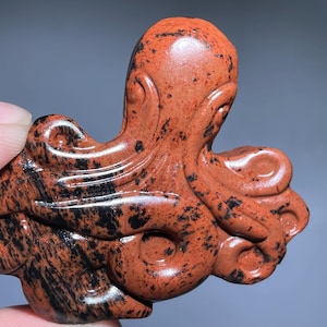 Hand Carved Red Obsidian Octopus Skull: Crystal Home Decor