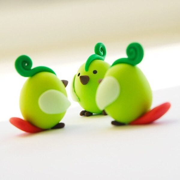 Curious green birdie