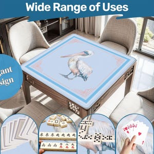 May include: Square wooden game table with a light blue surface featuring a pelican illustration. The table has a decorative border and is surrounded by chairs. The image includes the text "Elegant Design" and "Wide Range of Uses".