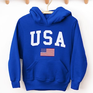 May include: Royal blue hooded sweatshirt with a white "USA" graphic and a small American flag.
