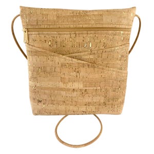 Bolso bandolera de corcho con diseño salpicado de oro y dos bolsillos entrecruzados