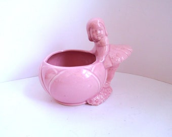 vintage pink planter with little girl