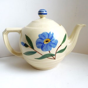 Vintage 1940s Shawnee Pottery teapot with blue flowers