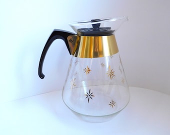 Vintage Pyrex glass carafe with gold stars 1960s