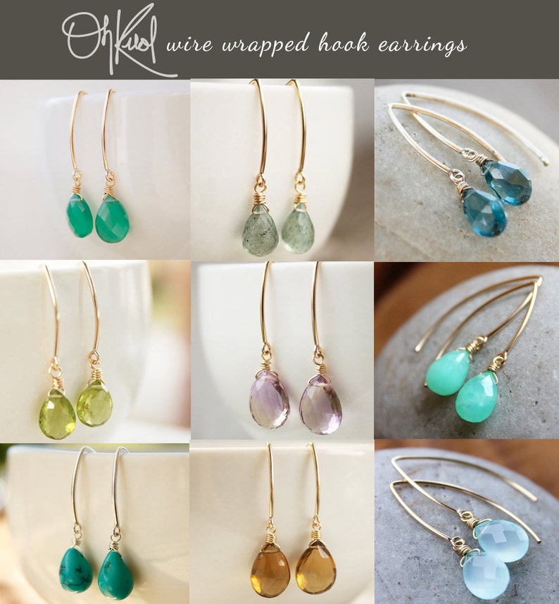 May include: A collection of wire wrapped hook earrings featuring various gemstone drops, including green, blue, purple, and brown.  OhKool wire wrapped hook earrings.