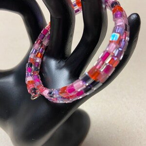 Wrap bracelet, shades of purple colored beads