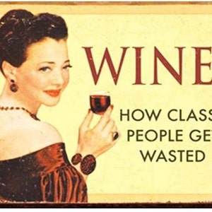 May include: A vintage-style metal sign with a woman holding a glass of red wine. The sign reads "WINE! HOW CLASSY PEOPLE GET WASTED."