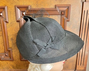 Incredible late 1930s asymmetrical black hat, original and New Old Stock - size up to 22" head