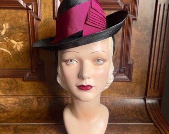 Early 1940s glossy straw “toy” hat with fancy  magenta/raspberry ribbon, New Old Stock