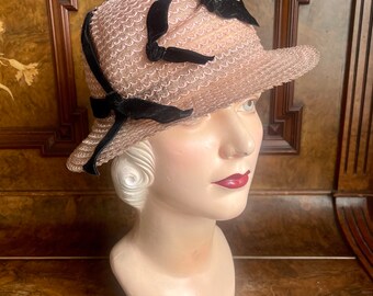 1930s fabulous pink translucent straw hat with black velvet bows. Size 21.5” 55cm women’s small New Old Stock