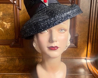 Late 30s or early 40s navy raffia tilt hat  with red/pewter deco ornament - New Old Stock S M L