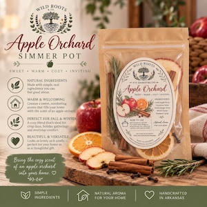 May include: A brown paper pouch labeled Wild Roots & Co. Apple Orchard Simmer Pot containing dried apple slices, cinnamon sticks, orange slices, whole cloves, and a rosemary sprig. The label lists ingredients and instructions for use.