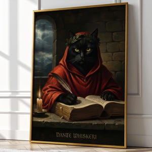 May include: Framed art print depicting a black cat in a red hooded robe, writing in a book with a quill. The cat wears a laurel wreath. A lit candle and the text "Dante Whiskeri" are also visible.