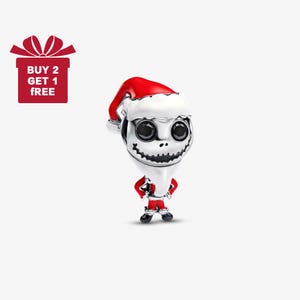 May include: A silver charm depicting a character in a Santa Claus outfit. The character has a white face, black eyes, and a stitched grin. The Santa hat is red with a white trim. A red gift box with the text "BUY 2 GET 1 FREE" is in the image.