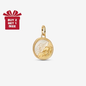 May include: Gold-tone pendant with a circular design featuring a relief of a winged horse. The pendant has a white and gold color scheme. The image also includes a red gift box with the text "BUY 2 GET 1 FREE".