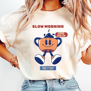 Cozy vintage coffee graphic tee on ivory comfort colors shirt lifestyle mockup