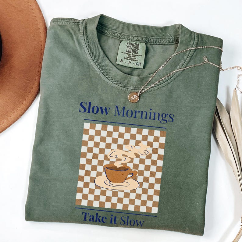 slow living coffee shirt comfort colors moss green flatlay aesthetic coffee lifestyle tee