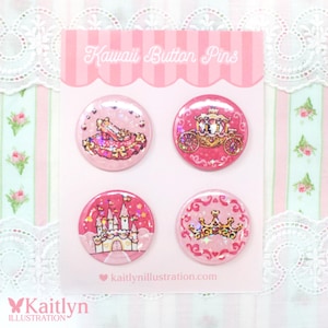 May include: Four pink Kawaii Button Pins with princess-themed illustrations. The pins depict a dress, carriage, castle, and crown. The card displays "Kawaii Button Pins" and the website "kaitlynillustration.com".