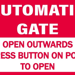 May include: A red sign with white text. The words "AUTOMATIC GATE" are at the top. Below, a white box states "OPEN OUTWARDS", "PRESS BUTTON ON POST", and "TO OPEN".