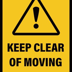 May include: A yellow rectangular sign with black text and a black triangle containing an exclamation mark. The text reads "KEEP CLEAR OF MOVING MACHINERY". This is a safety warning sign.
