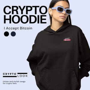 May include: Black Crypto Hoodie with the text "CRYPTO HOODIE" and "I Accept Bitcoin". The hoodie has a front pocket and a small "I Accept Bitcoin" logo. The image also includes the text "CRYPTO LOOK" and "Unisex and stylish swags for crypto fans."