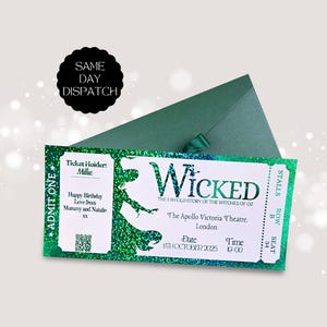 May include: A rectangular Wicked musical theatre ticket with a green glitter finish and a matching dark green envelope. The ticket features the text Wicked The Untold Story of the Witches of Oz, The Apollo Victoria Theatre, London, 11th October 2025, 19:00.