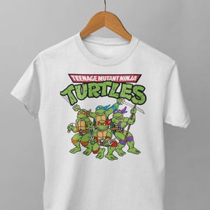 Cowabunga! Zijn terug! Retro uniseks T-shirt | Episch ontwerp | Perfect cadeau-idee