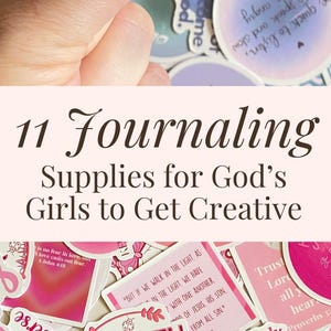 May include: A collection of stickers with inspirational quotes and phrases, including "God Loves You" in blue bubble letters. The stickers are in various colors, with pink and purple dominating, and feature butterflies and other designs. The image also includes the text "11 Journaling Supplies for God's Girls to Get Creative."