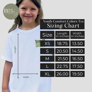 May include: Youth Comfort Colors Tee sizing chart with measurements in inches. The chart shows sizes XS, S, M, L, and XL with corresponding length and width measurements.