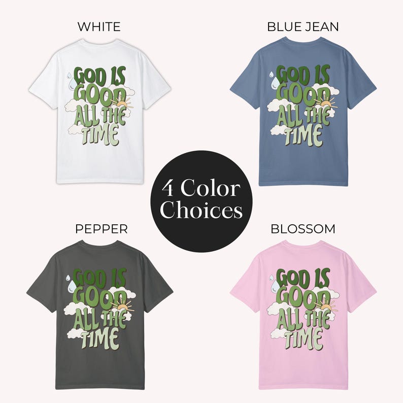 May include: Four t-shirts with the text "God is good all the time" in green lettering on a white, blue, gray, and pink background. The shirts have a cartoon sun, clouds, and raindrop graphic.