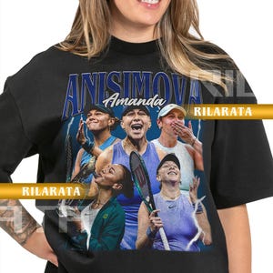 May include: Black adult unisex t-shirt featuring a graphic of tennis player Amanda Anisimova. The design includes her name and images of her playing tennis. The shirt also has the text "RILARATA" and "READY CUSTOM DESIGNS".